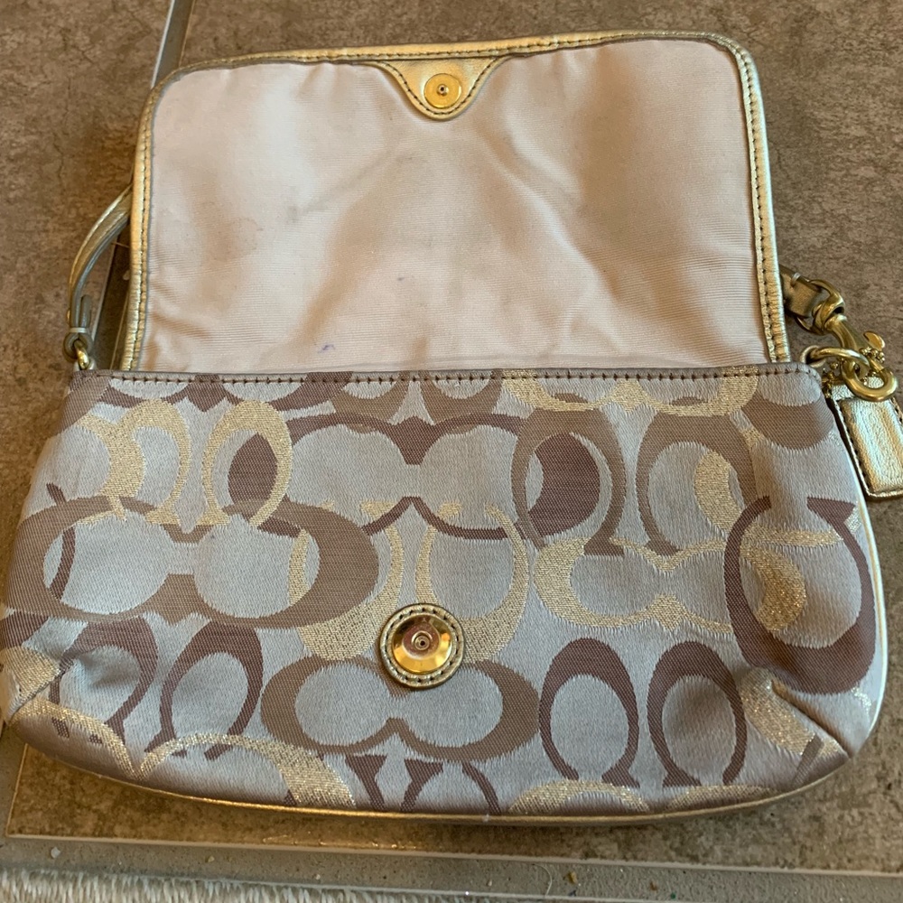 Gold canvas coach wristlet